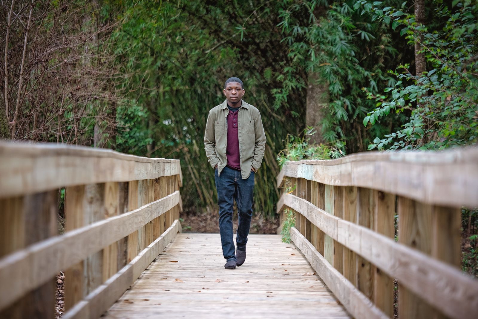 Wooden footbridge leading into the trees at Dorothy B. Oven Park, Tallahassee